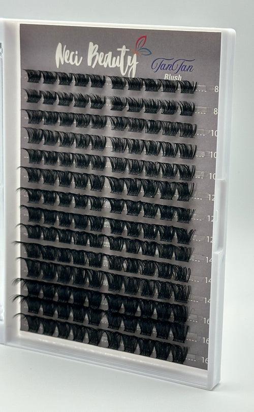 Eyelash cluster tray with 'Neci Beauty' branding on a gray background