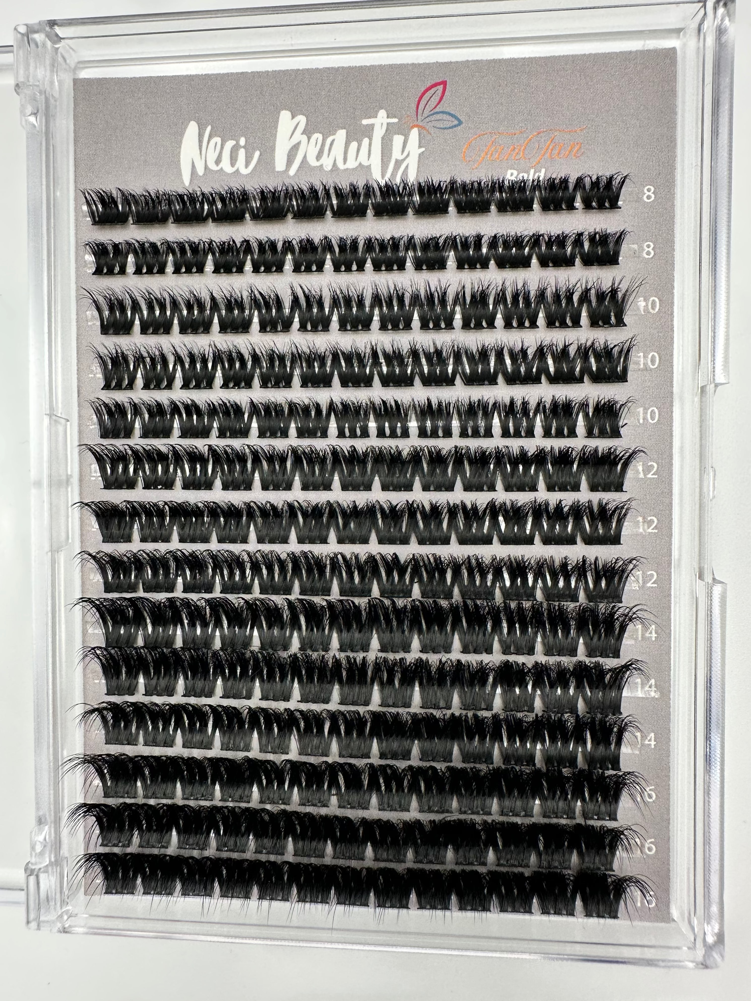 Eyelash extension tray with multiple rows of false eyelashes in a clear case, branded 'Neci Beauty'.