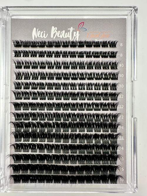 Eyelash extension tray with multiple rows of false eyelashes on a gray background