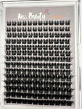 Set of false eyelashes in a clear case with 'Neci Beauty' branding.